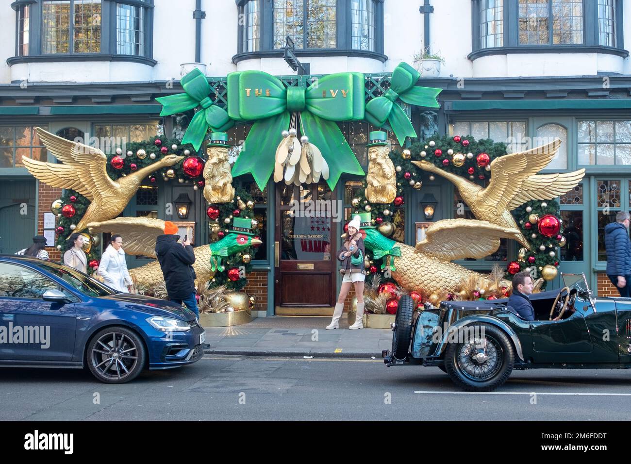 London - December 2022: The Ivy on Kings Road Chelsea with seasonal decorations adorning the entrance Stock Photo