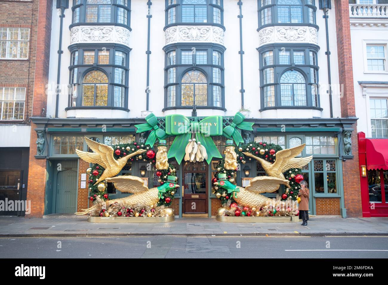 London - December 2022: The Ivy on Kings Road Chelsea with seasonal decorations adorning the entrance Stock Photo
