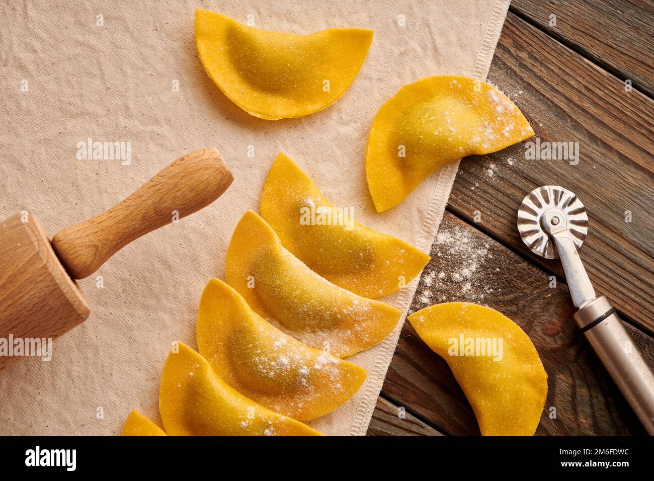 Raw homemade ravioli pasta with spinach and ricotta Stock Photo - Alamy
