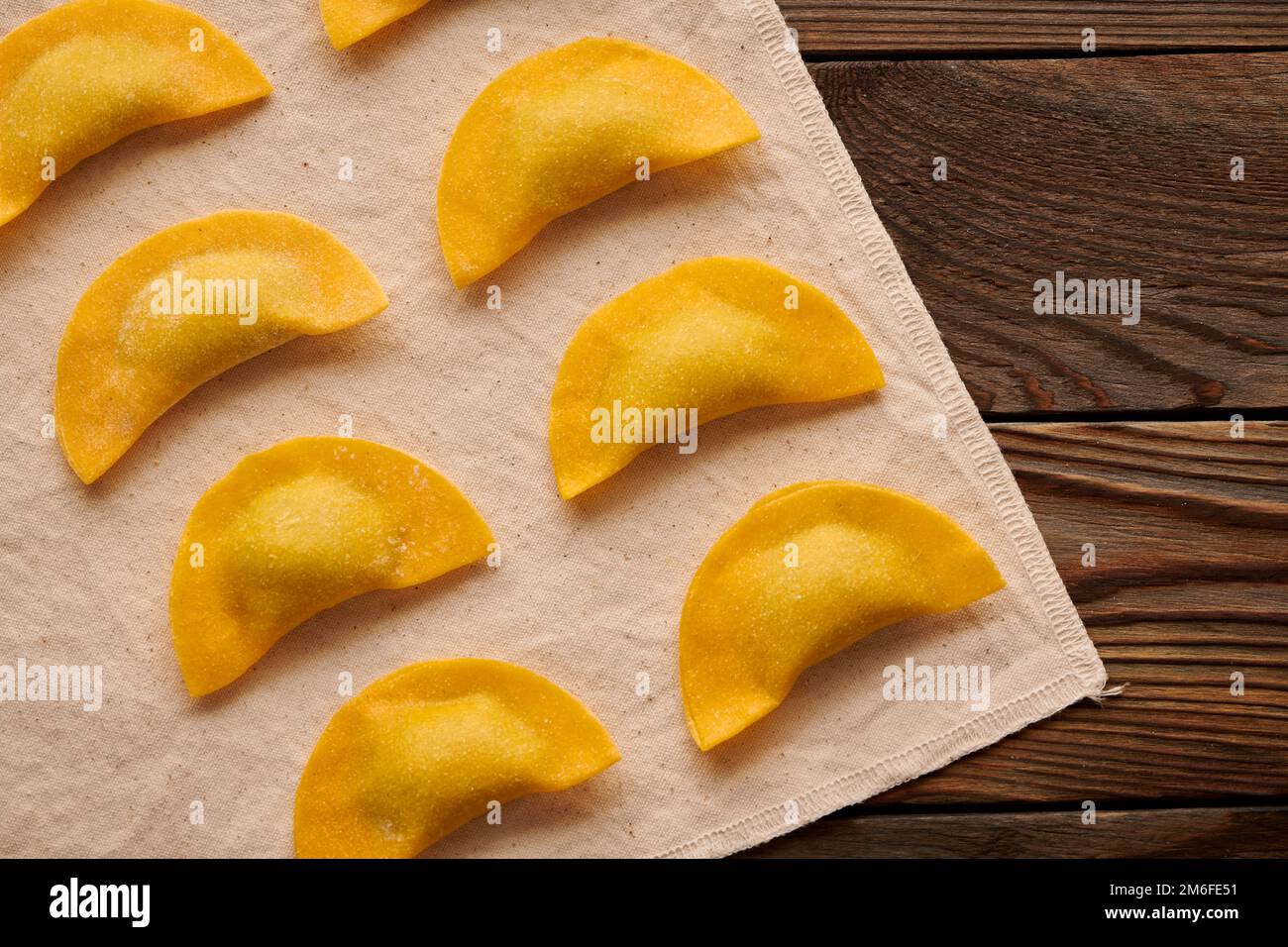 Raw homemade ravioli pasta with spinach and ricotta Stock Photo - Alamy