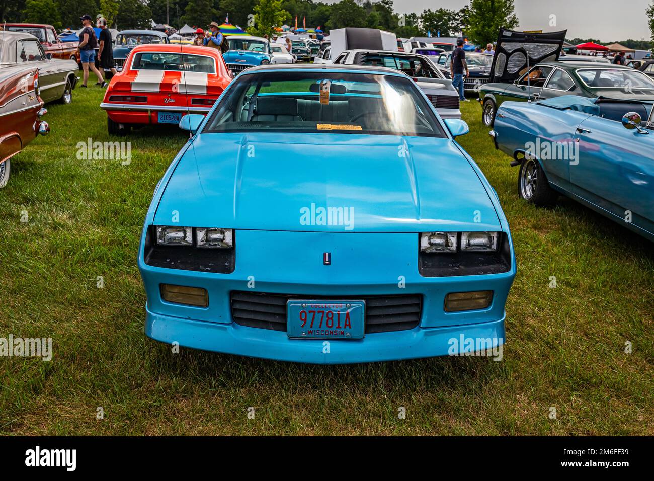 Iola, WI - July 07, 2022: High perspective front view of a 1990 Chevrolet Camaro RS Coupe at a local car show. Stock Photo