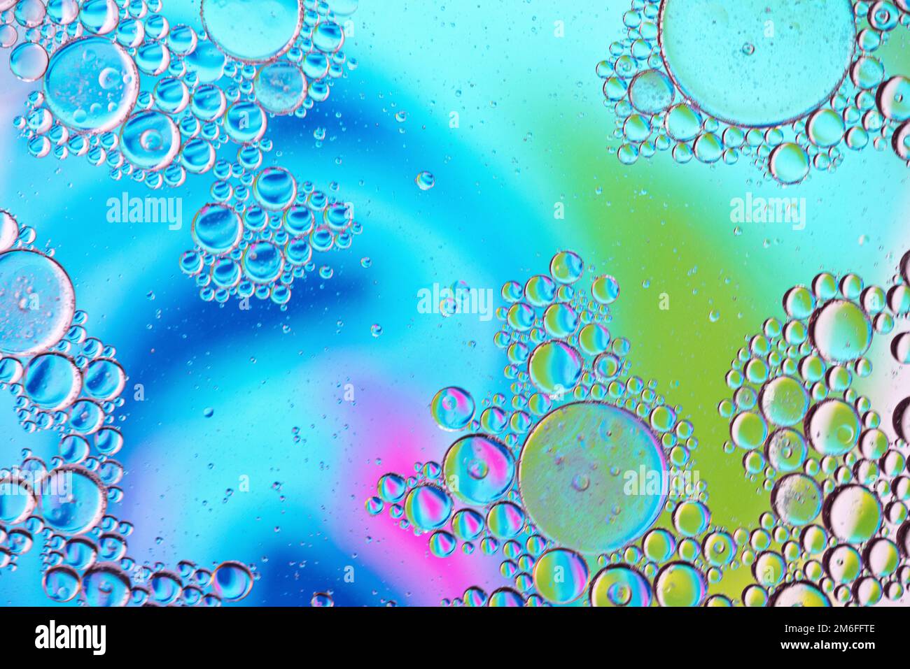 Colorful abstract background with oil drops on water Stock Photo