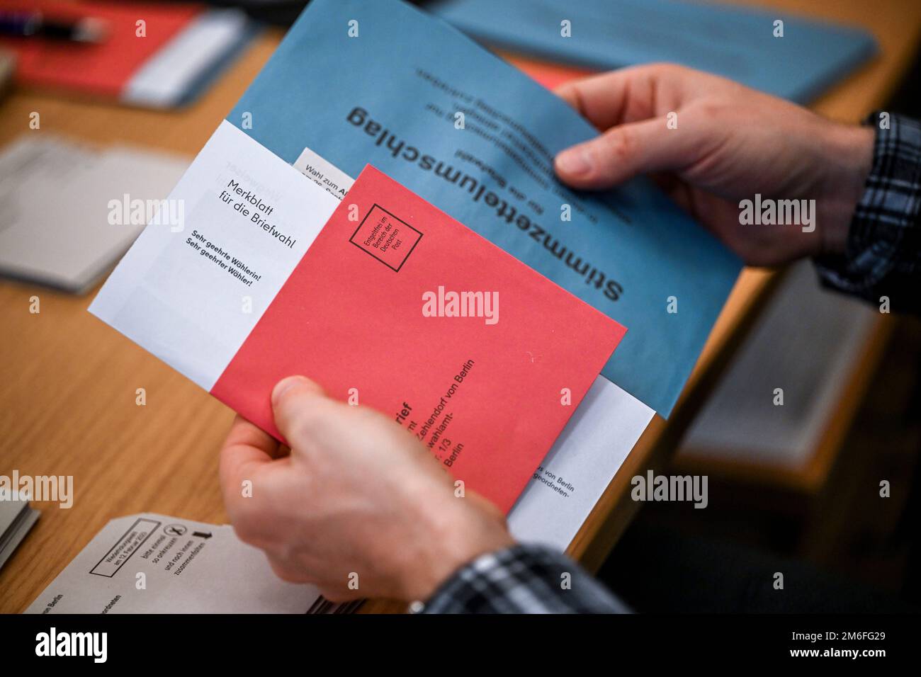 04 January 2023, Berlin A person holds election documents for the
