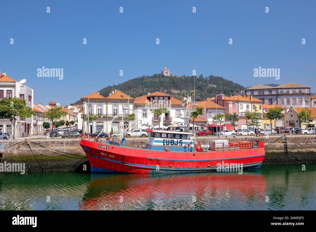 Red Fishing Boat Moored on a Pier - Viana do Castelo, Portugal Stock Photo