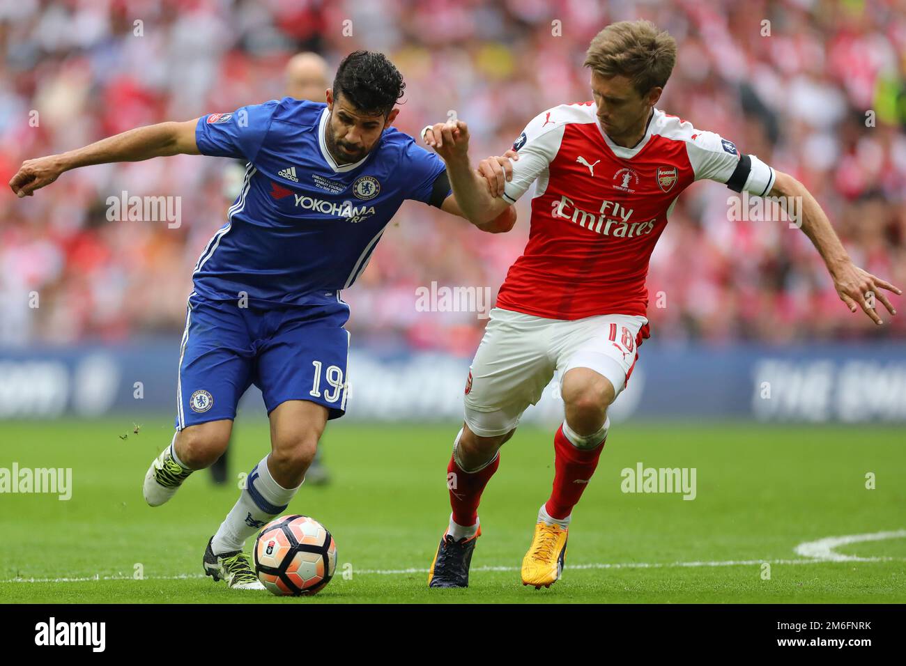 Diego Costa of Chelsea battles with Nacho Monreal of Arsenal - Arsenal v Chelsea, The Emirates FA Cup Final, Wembley Stadium, London - 27th May 2017. Stock Photo