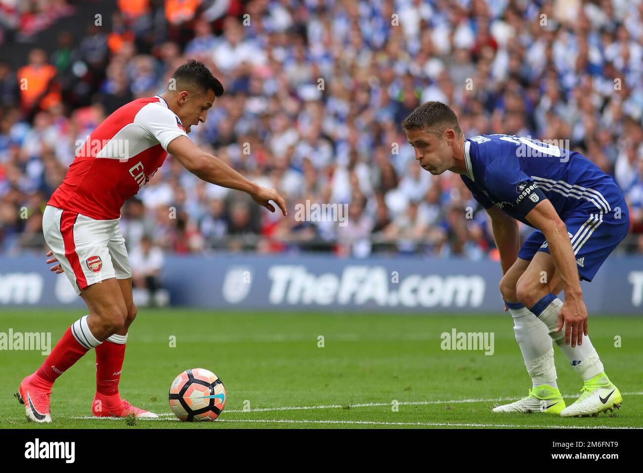 Alexis Sanchez of Arsenal takes on Gary Cahill of Chelsea - Arsenal v Chelsea, The Emirates FA Cup Final, Wembley Stadium, London - 27th May 2017. Stock Photo