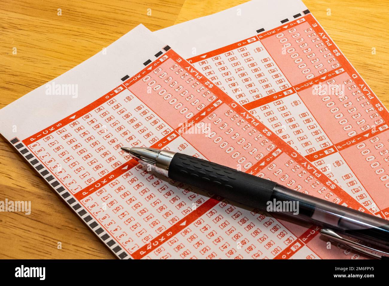 Lottery play slips with black pen. Lotto number selection forms Stock