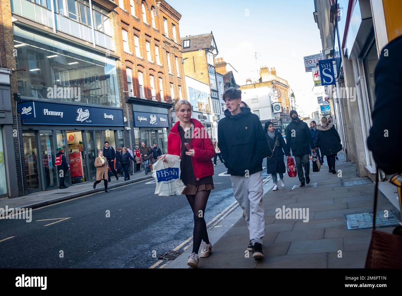 London- December 2022: Shoppers on Richmond high street Stock Photo