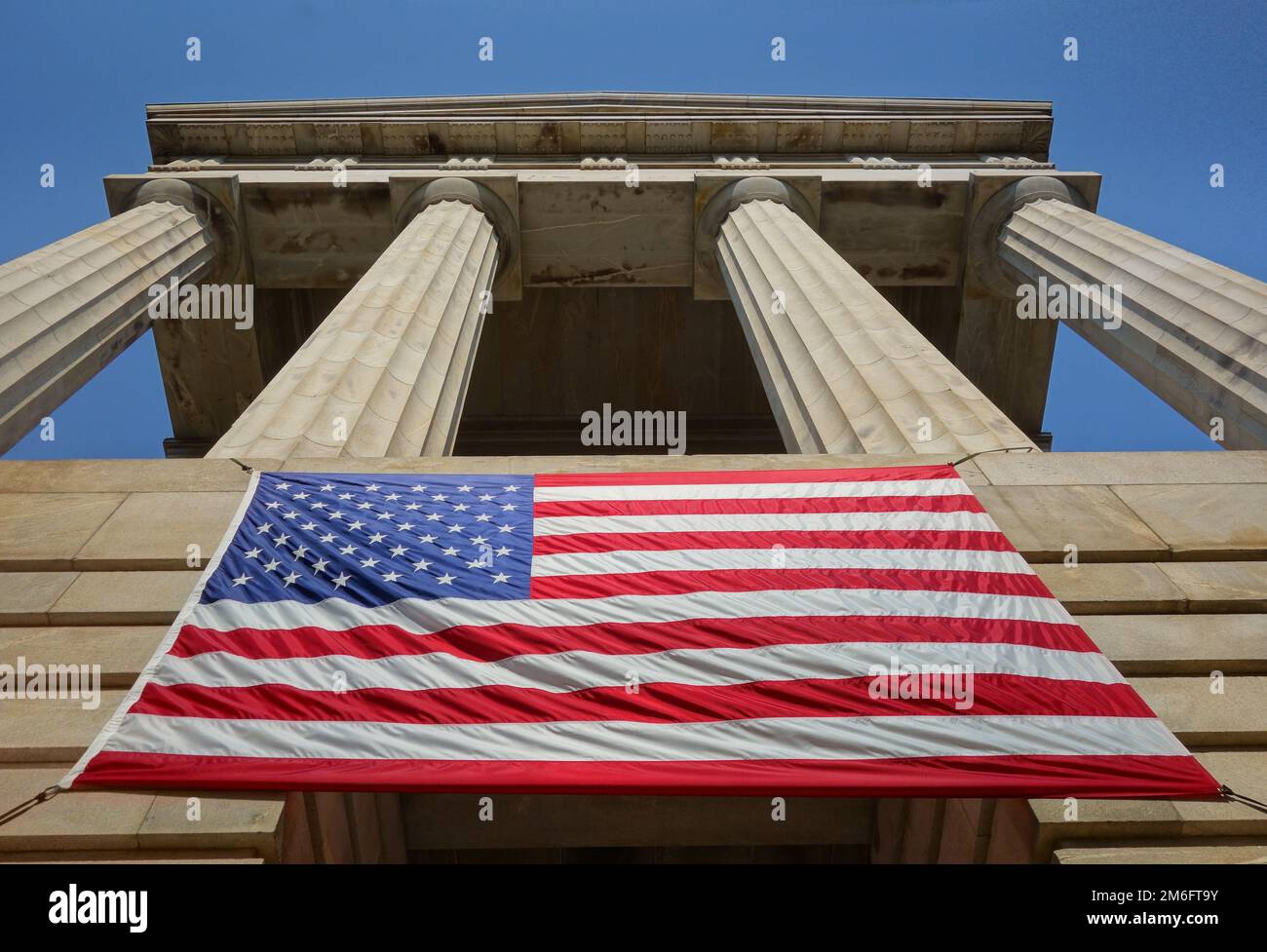 The North Carolina state capitol building in Raleigh decorated with the American flag for the 4th of July Stock Photo