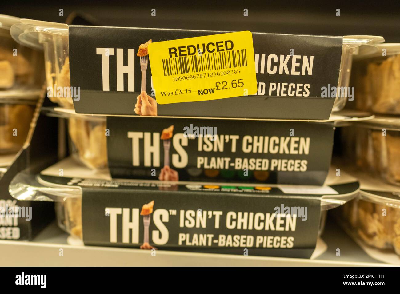 Surrey UK- December 2022: Reduced unsold meat free products on supermarket shelf Stock Photo