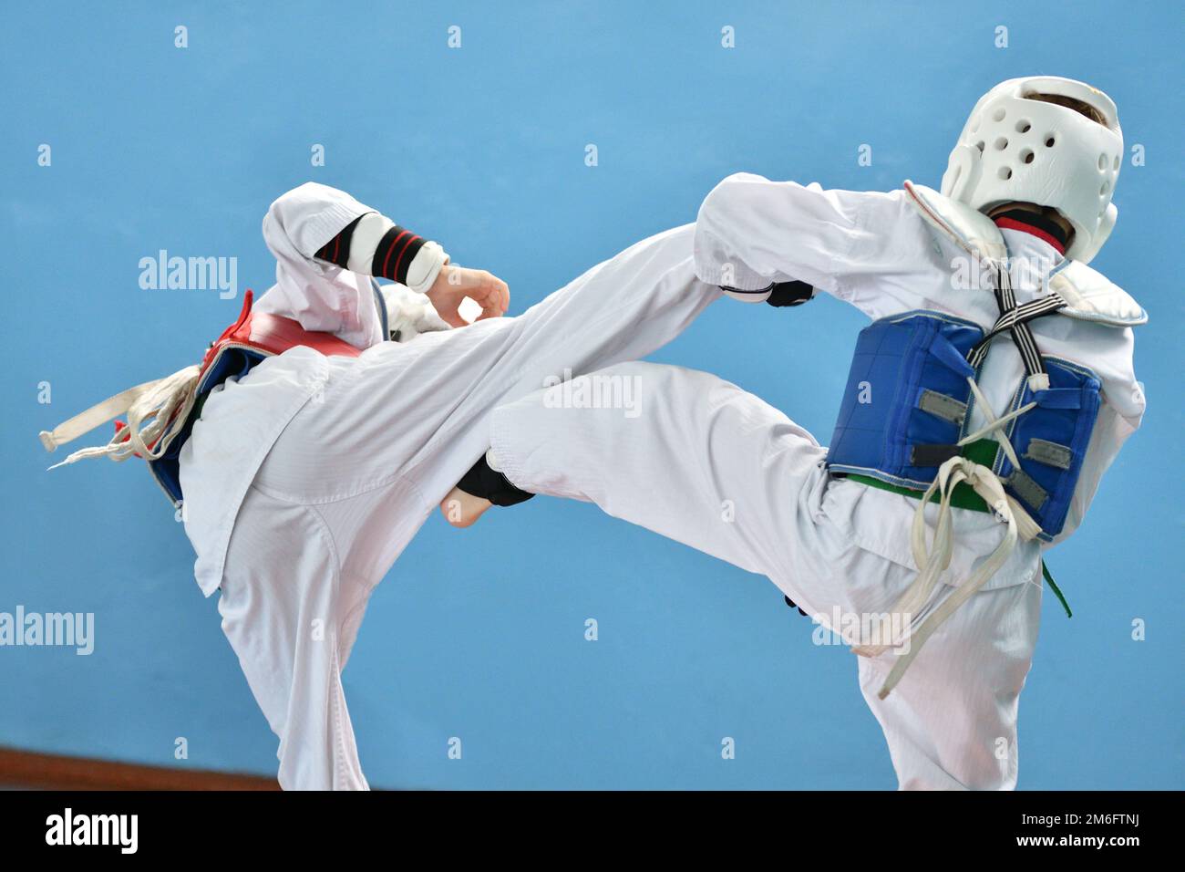 Boy compete in taekwondo (Korean martial arts Stock Photo Alamy