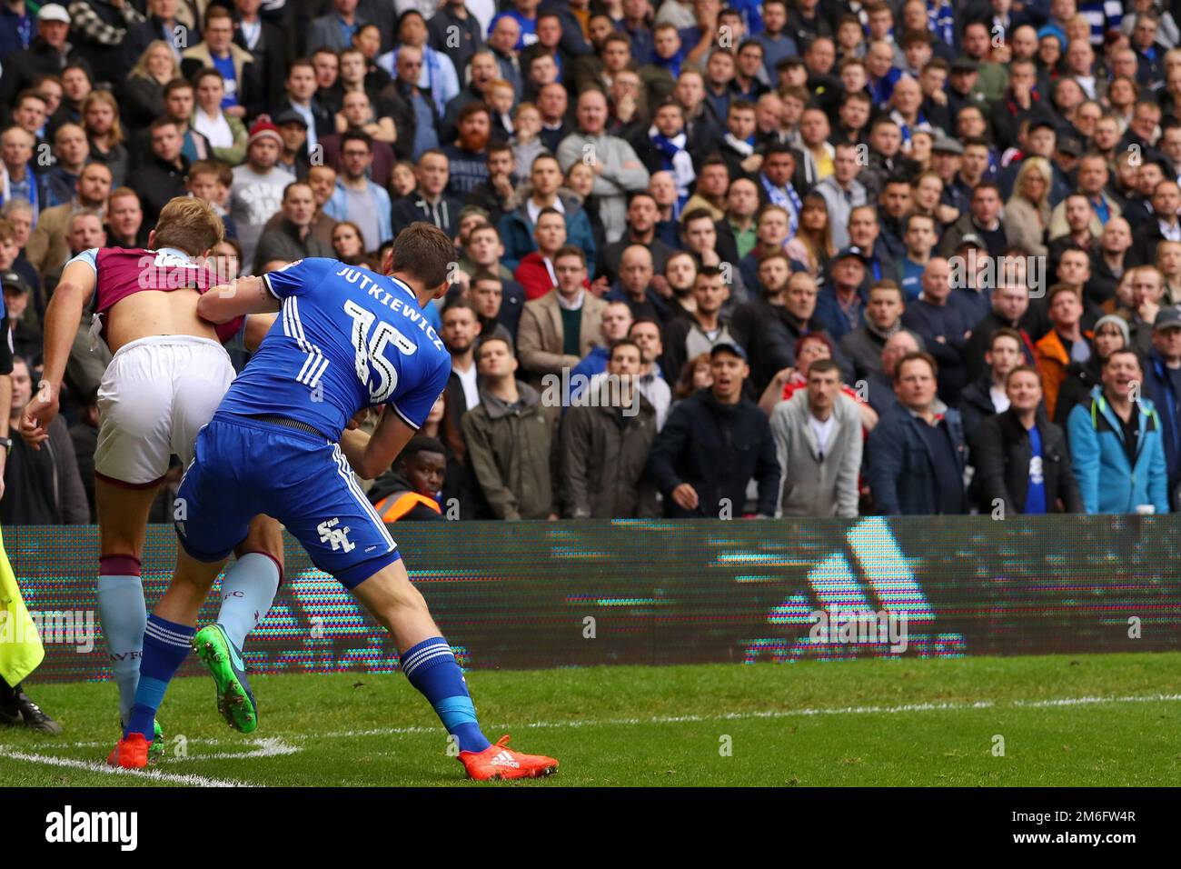 Birmingham City fans watch on as Lukas Jutkiewicz of Birmingham City battles with Nathan Baker of Aston Villa - Birmingham City v Aston Villa, Sky Bet Championship, St Andrew's, Birmingham - 30th October 2016. Stock Photo