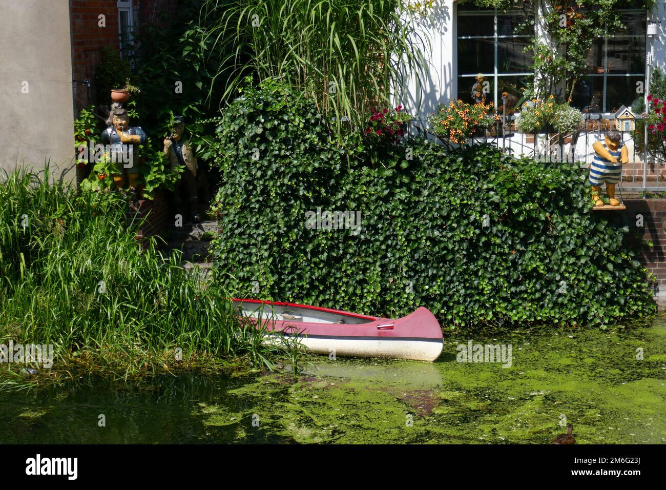 Boat at the old water mill in bad oldesloe Stock Photo Alamy