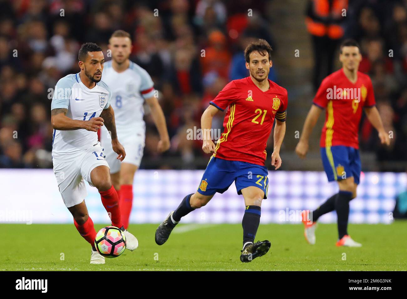 Theo Walcott of England and David Silva of Spain - England v Spain, International Friendly, Wembley Stadium, London - 15th November 2016. Stock Photo