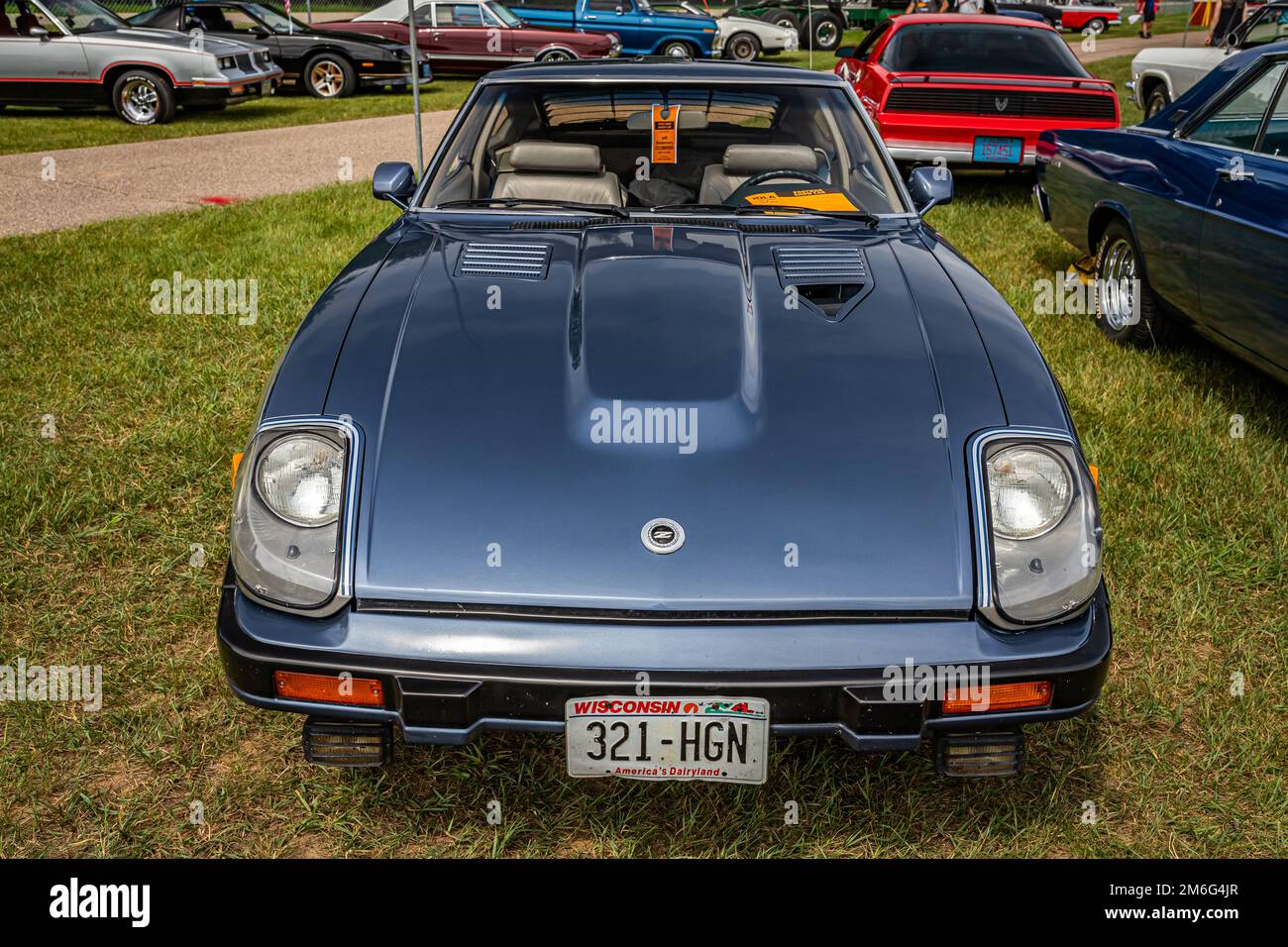 Iola, WI - July 07, 2022: High perspective front view of a 1983 Datsun 280ZX Turbo at a local car show. Stock Photo
