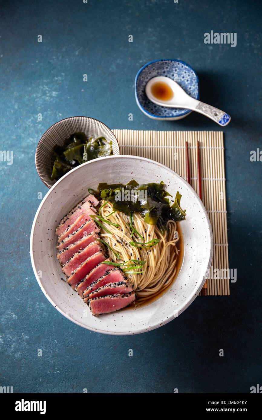 Tuna steak ramen. Japanese soup with noodles ramen, miso, fried tuna