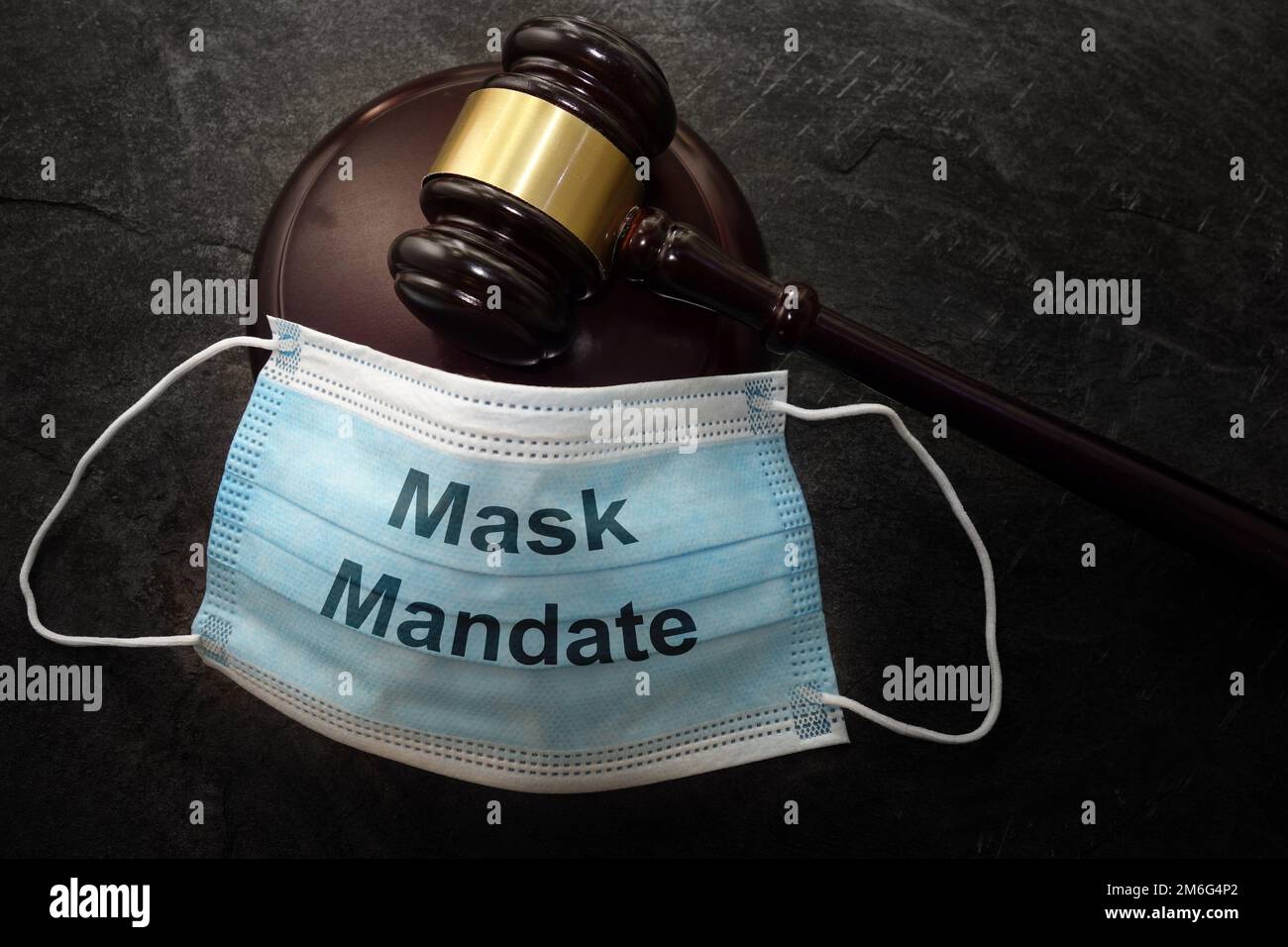 Court legal gavel and Mask Mandate facemask Stock Photo