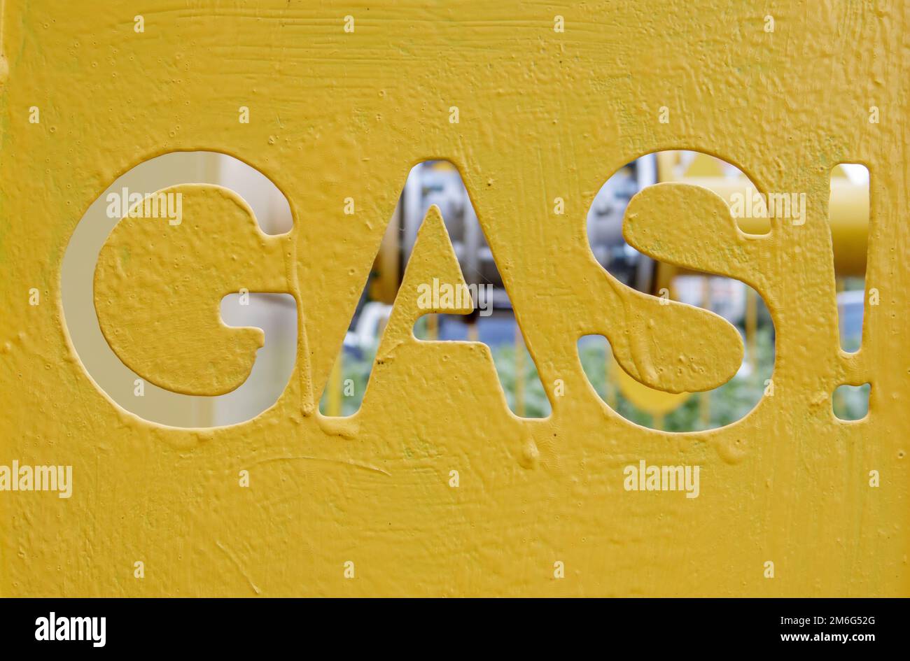 Warning on a metal cage with gas equipment for the public. Attention