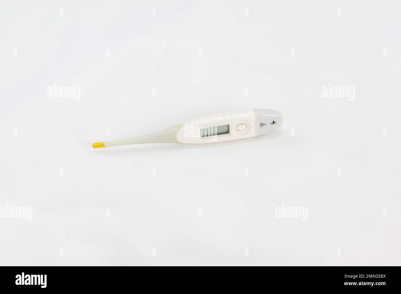 https://c8.alamy.com/comp/2M6G58X/digital-thermometer-with-gold-tip-on-a-white-background-2M6G58X.jpg