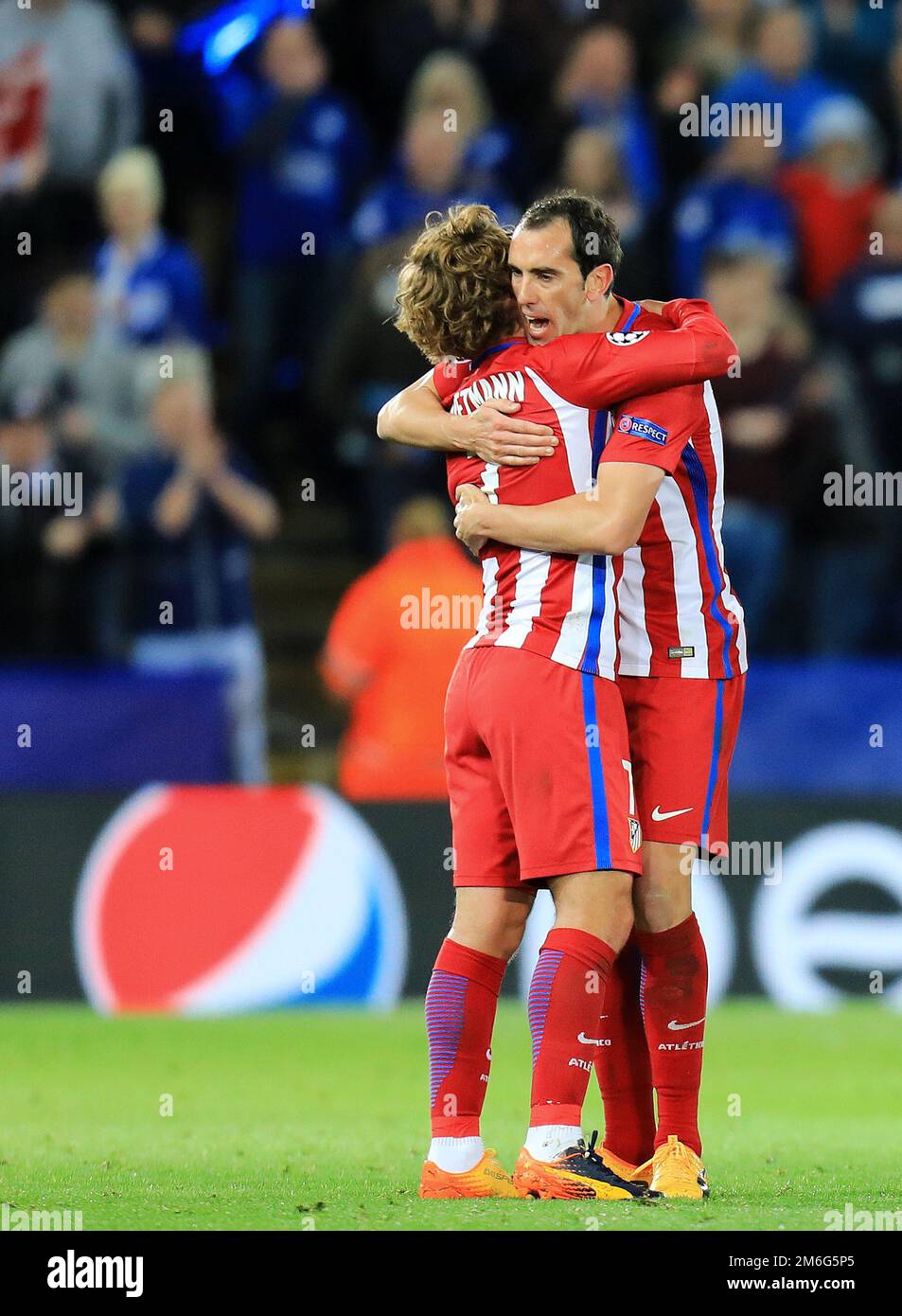 Antoine Griezmann and Diego Godin of Atletico Madrid celebrate after beating Leicester City to reach the semi finals of the Champions League - Leicester City v Atletico Madrid, UEFA Champions League Quarter-final second leg, Leicester City Stadium, Leicester - 18th April 2017. Stock Photo