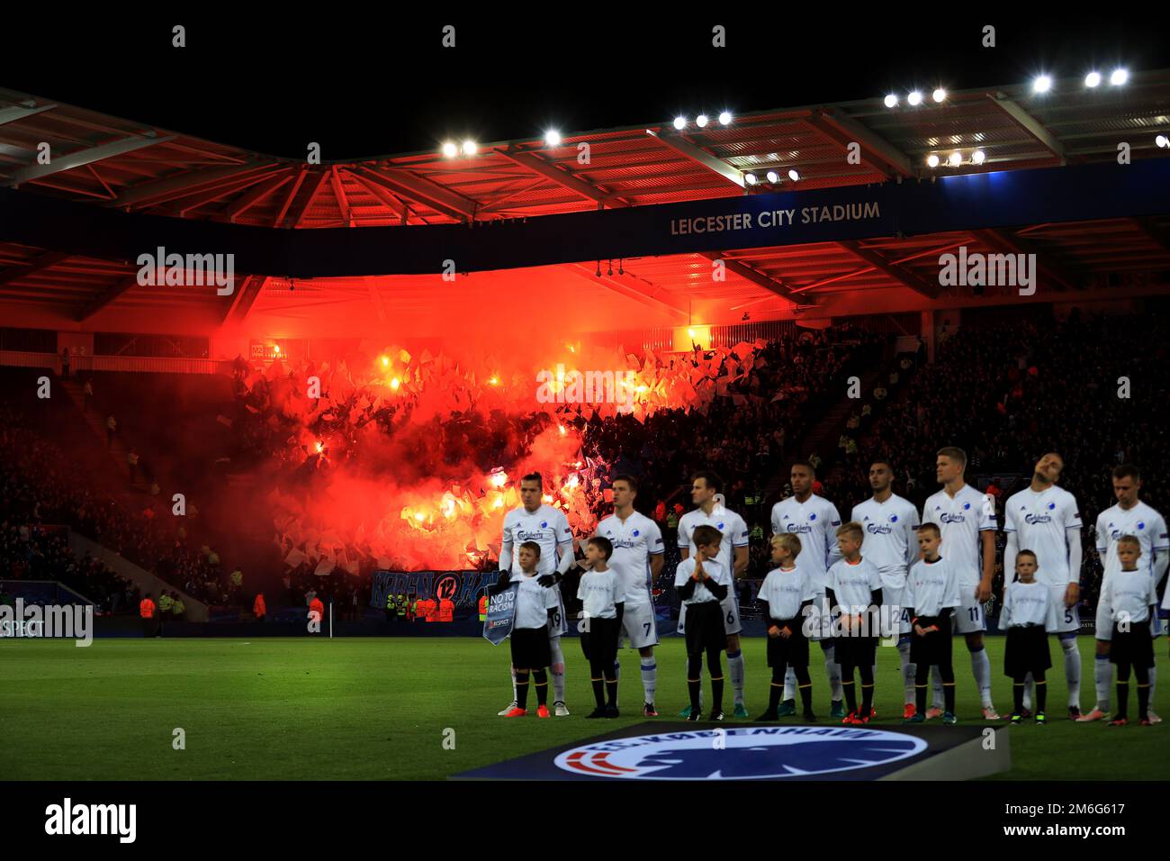 As FC Copenhagen line up the Copenhagen fans light flares in the crowd - Leicester City v FC Copenhagen, UEFA Champions League, Leicester City Stadium, Leicester - 18th October 2016. Stock Photo