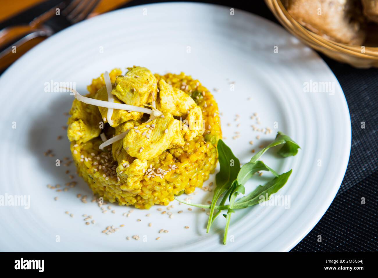 Risotto with chicken curry. Risotto is a northern Italian rice dish ...