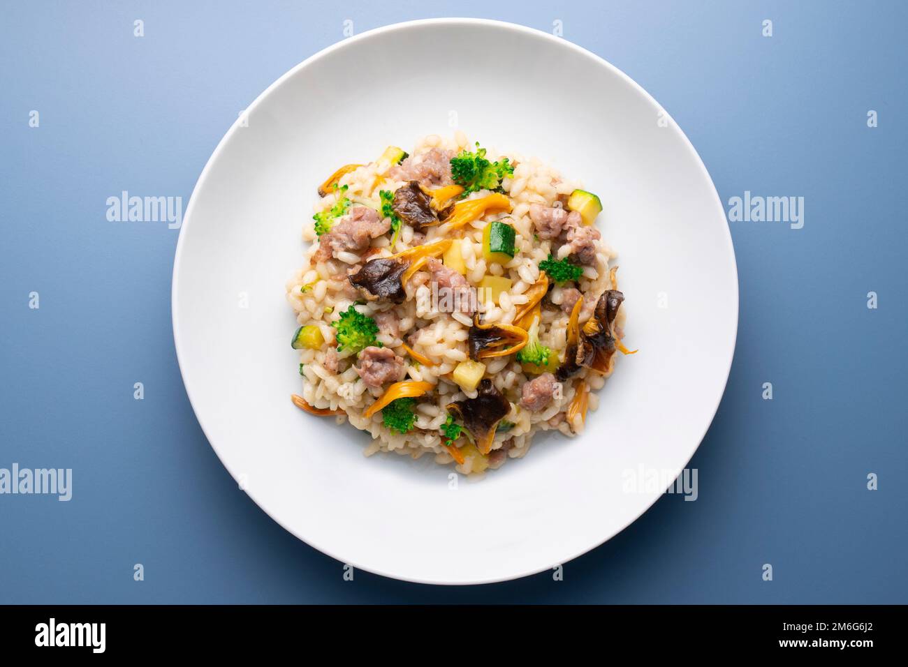 Risotto with mushrooms and vegetables. Risotto is a northern Italian