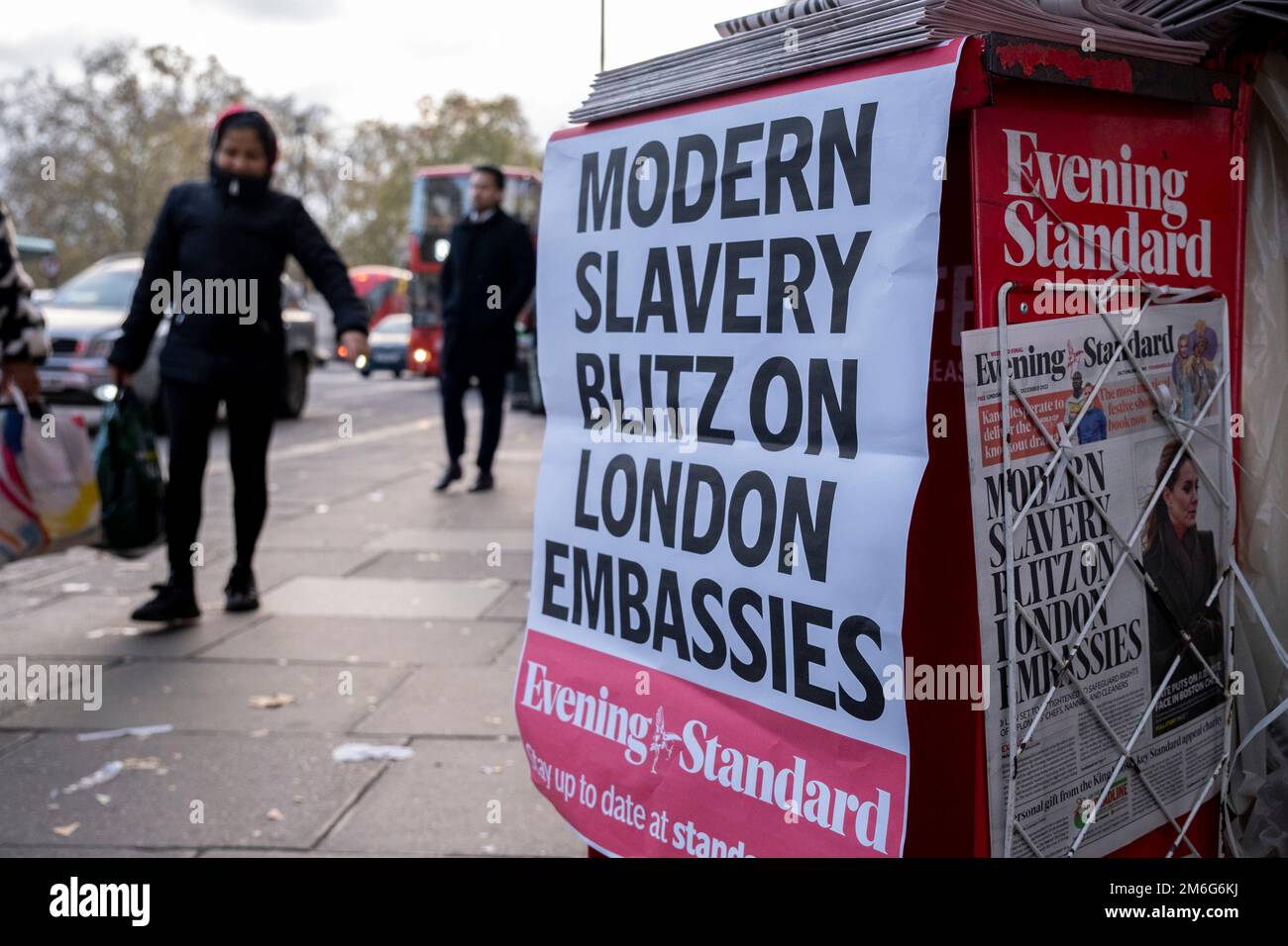 Evening Standard newspaper headline poster related to modern slavery at Londons embassieson 2nd December 2022 in London, United Kingdom. Following a Supreme Court ruling that elements of the 1978 State Immunity Act or SIA are not accordant with the European Convention on Human Rights, a new law will be passed to stop foreign embassies in London from claiming immunity from legal actions being taken by ‘domestic workers’ under their employment. The law will allow these workers to take them to an employment tribunal for malpractice including what is known as ‘modern day slavery’. Stock Photo