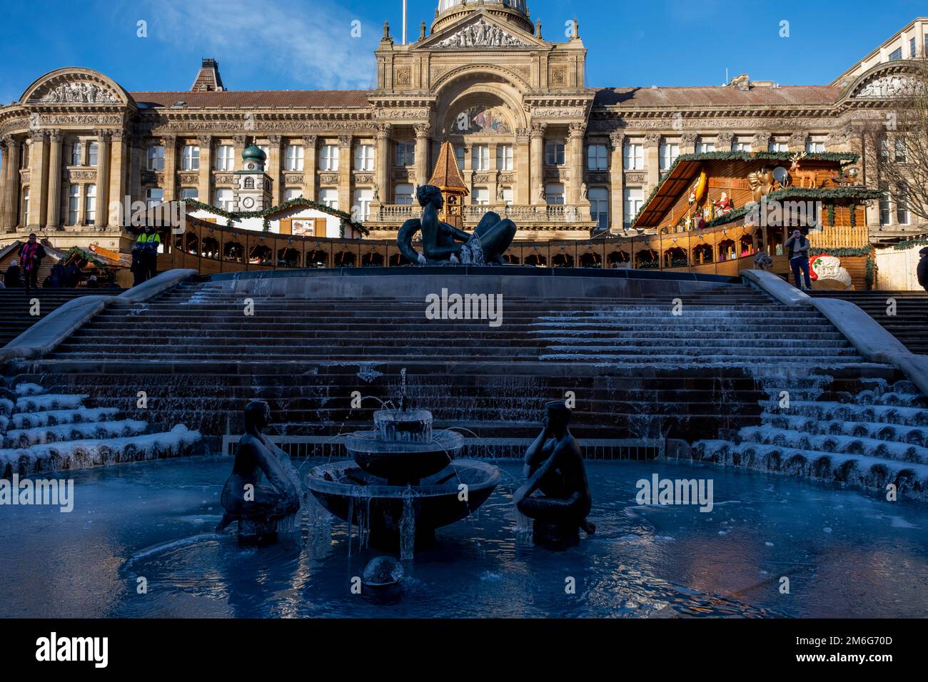 Frozen over fountain known locally as The Floozie in the Jacuzzi in Victoria Square on 16th December 2022 in Birmingham, United Kingdom. The River, affectionately known as the Floozie in the Jacuzzi, is an artwork by Dhruva Mistry, which following leaks costing two thousands pounds per day, the water was turned off in 2013 to save costs. As of 6 July 2015, the main pool was filled with soil and bedding plants and no longer functioned as a fountain, however in 2022 the water flowed again after a major restoration. Stock Photo