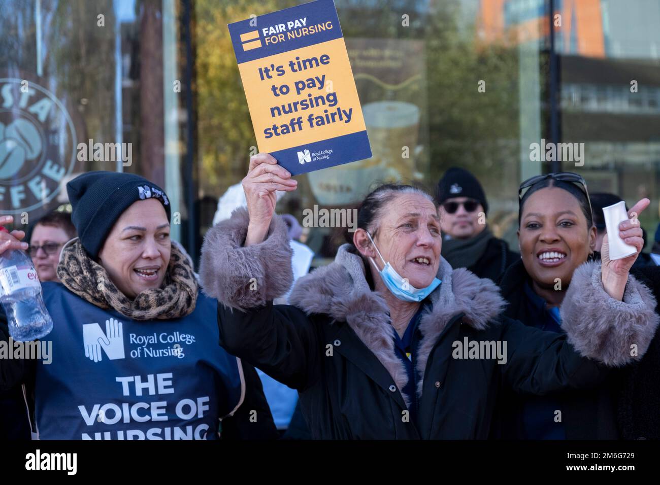 Nurses from the Royal College of Nursing strike for fair pay and working conditions in unprecedented industrial action by nurses outside the Queen Elizabeth Hospital on 15th December 2022 in Birmingham, United Kingdom. This is the first of two planned strikes before the end of the year, with the dispute possibly heading for more in the New Year if the government fails to improve their offer. Stock Photo