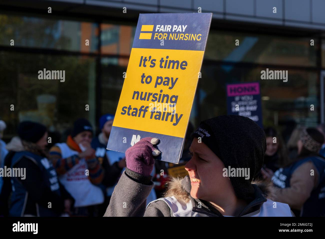 Nurses from the Royal College of Nursing strike for fair pay and working conditions in unprecedented industrial action by nurses outside the Queen Elizabeth Hospital on 15th December 2022 in Birmingham, United Kingdom. This is the first of two planned strikes before the end of the year, with the dispute possibly heading for more in the New Year if the government fails to improve their offer. Stock Photo