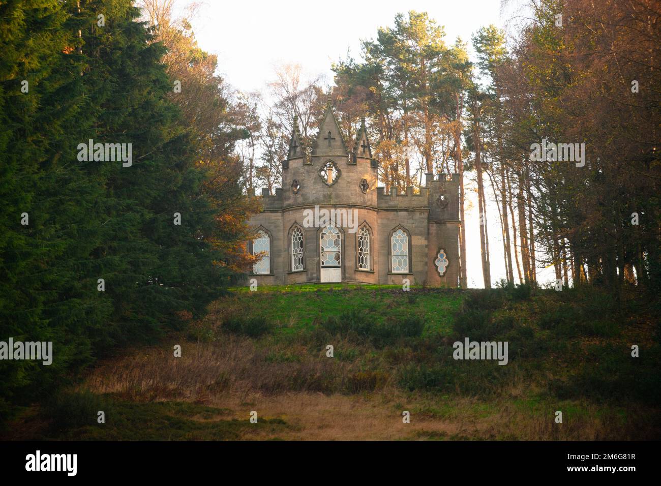 Banqueting House, a gothic style building overlooking a large pond on