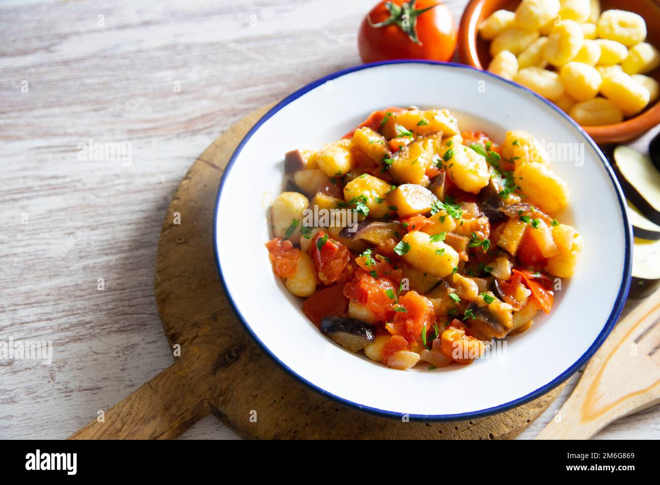 Sautéed gnocchi with grilled vegetables. Typical Italian recipe Stock