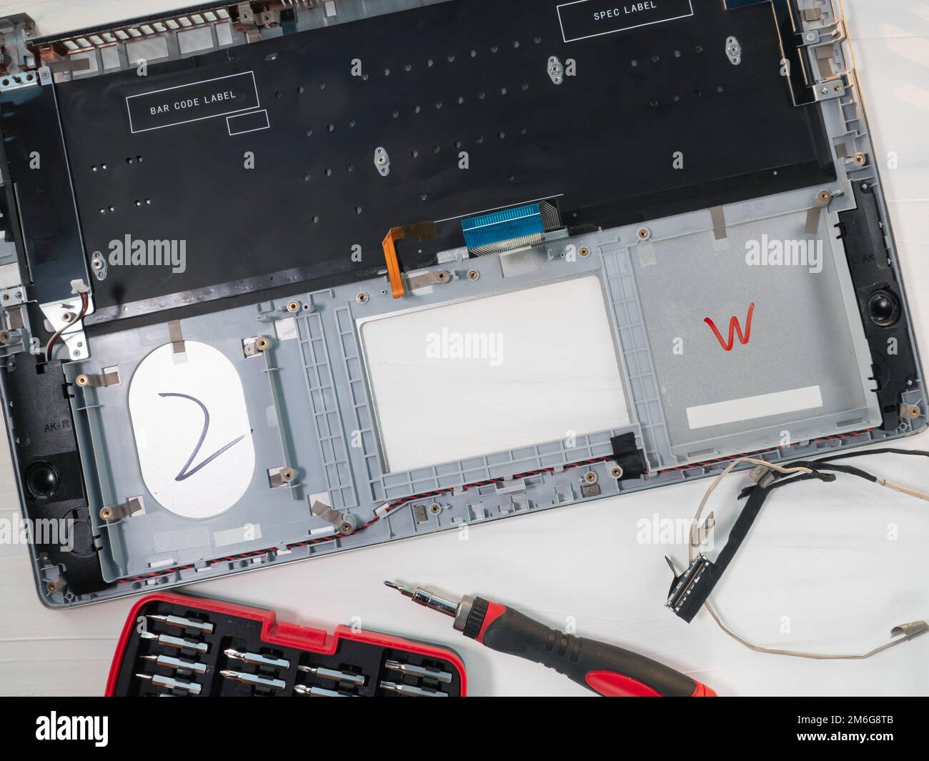Repair and maintenance of computer laptop, laptop lid disassembled and