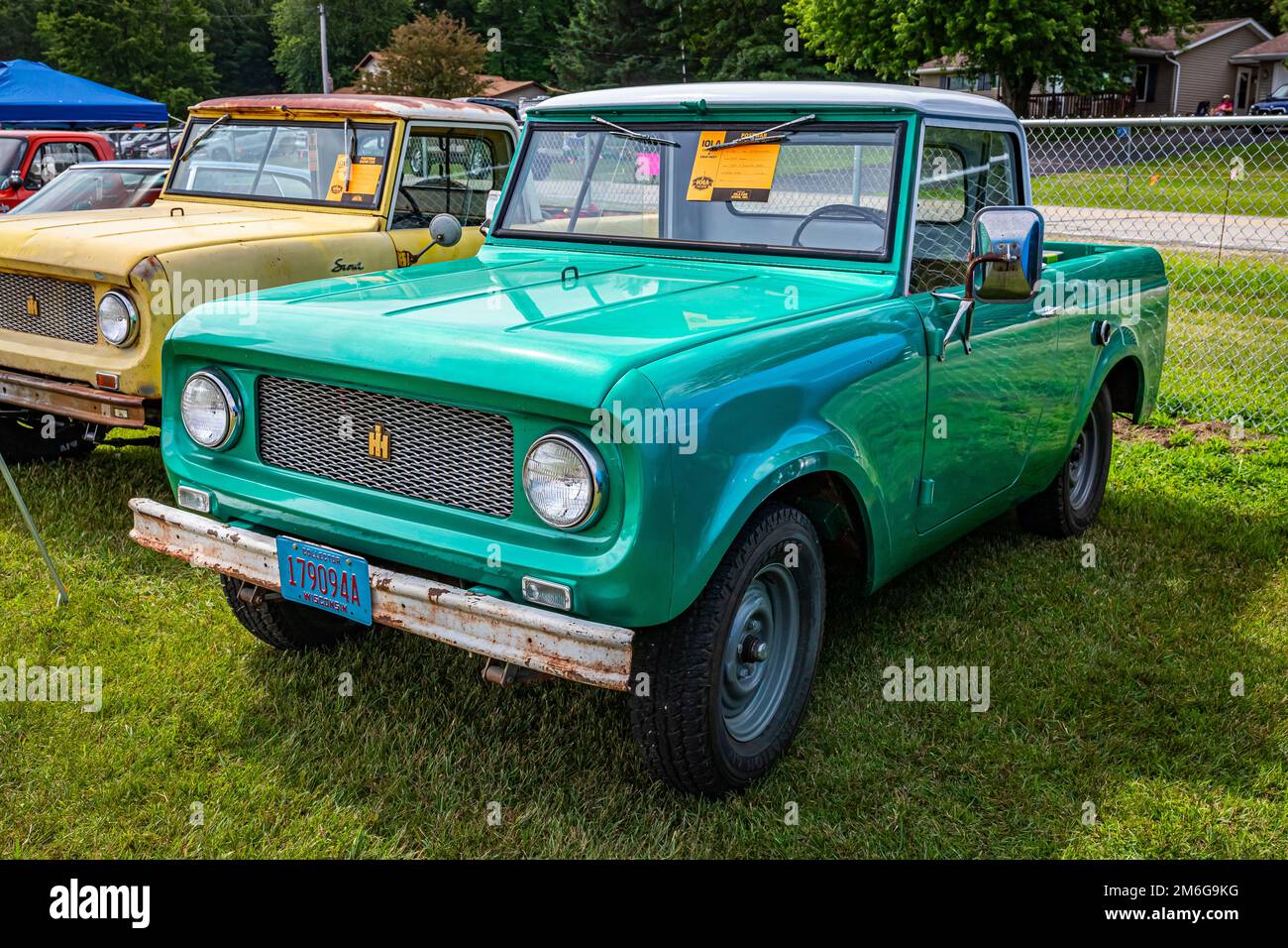Iola, WI - July 07, 2022: High perspective front corner view of a 1961 International Harvester Scout 80 Pickup at a local car show. Stock Photo