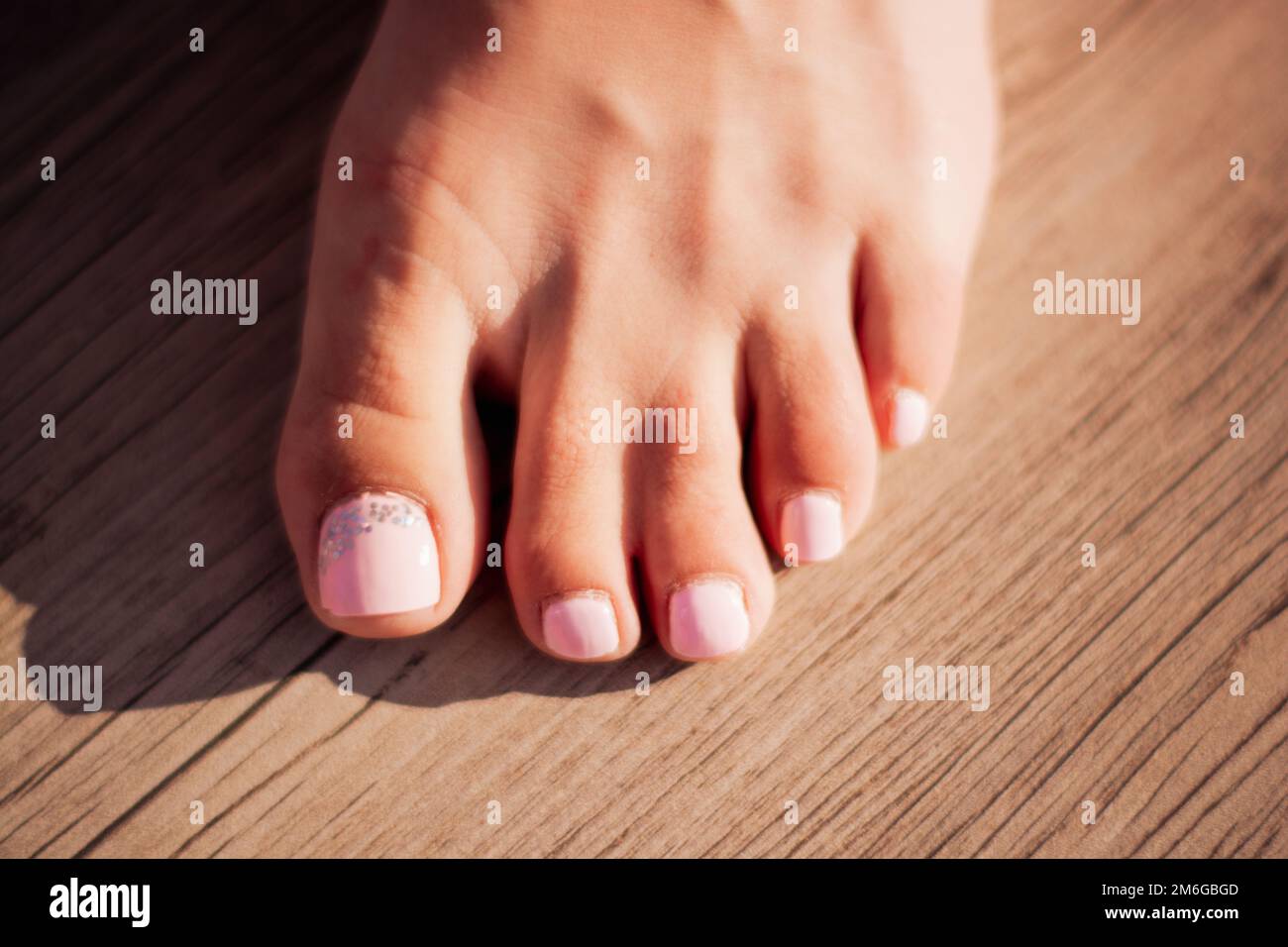 Unusual human toes. Two toes are joined together Stock Photo