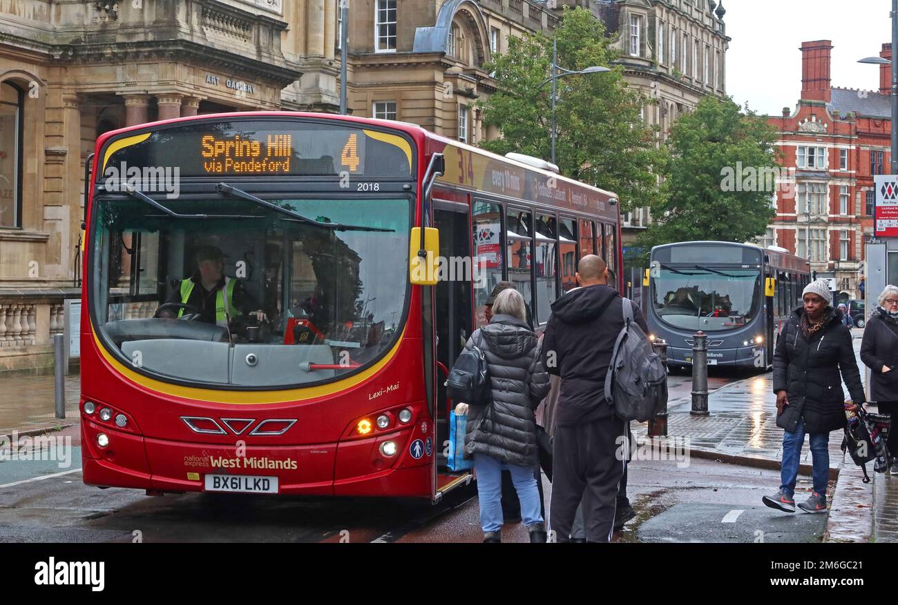No 4 bus, Spring Hill, via Pendeford, National Express West Midlands transport, red bus, in Wolverhampton town centre - Lexi-Mai Stock Photo