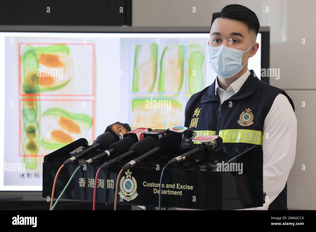 Jacky Yau Wing-yeung, Investigator, Drug Investigation Division 3, Customs Drug Investigation Bureau of Hong Kong Customs & Excise holds a presser on the arrest of a man in connection with the seizure of suspected cocaine weighing 31kg and carrying an estimated market value of $26m at Customs Headquarters in North Point. 28DEC22   SCMP / Jelly Tse Stock Photo