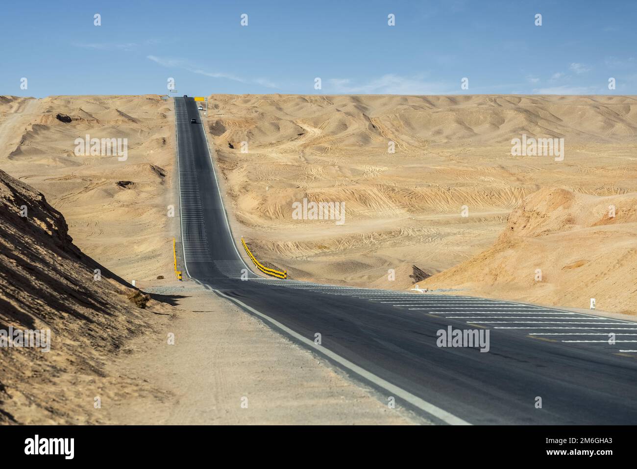 Undulating road in desert wilderness Stock Photo
