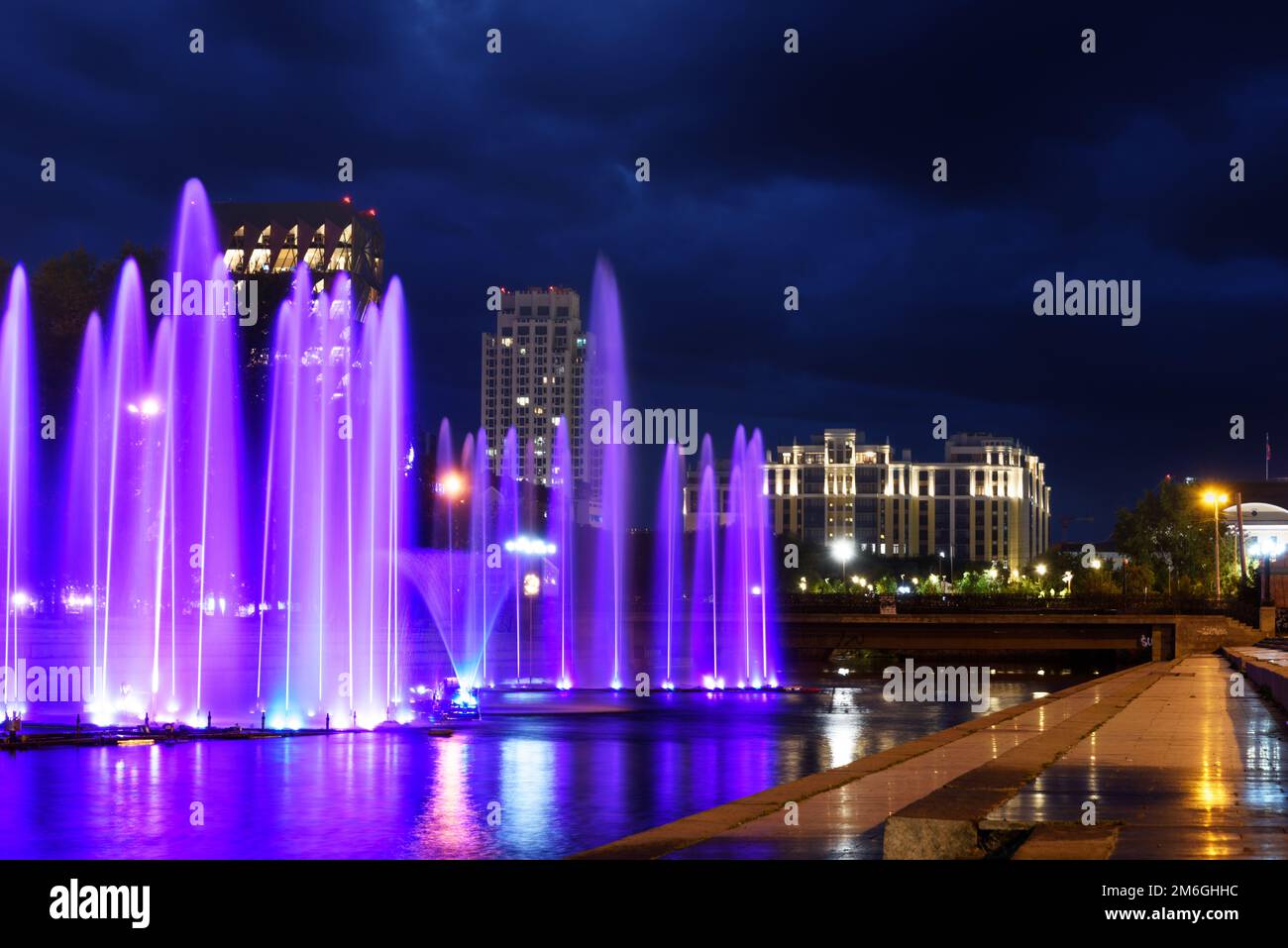 Illuminated fountains in the night city Stock Photo - Alamy