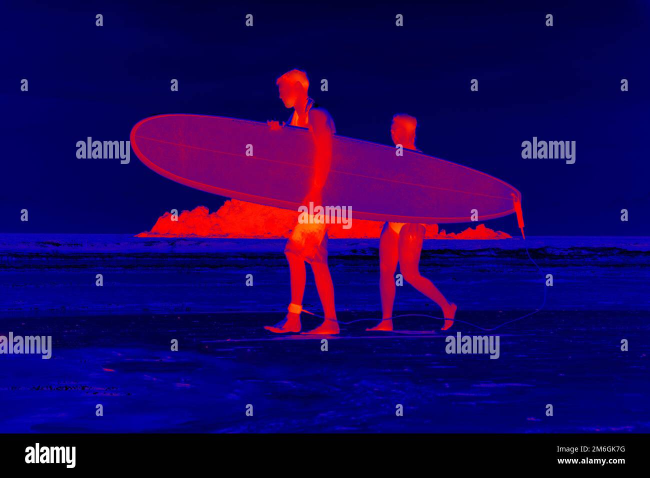 Recreation on the water. Surf lovers. The descent of a surfboard on the