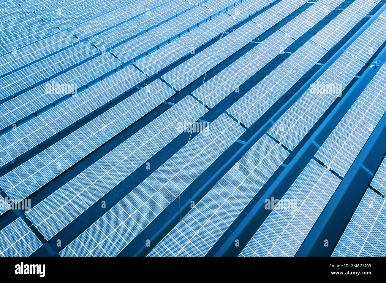 Aerial view of photovoltaic power station on lake blue Stock Photo