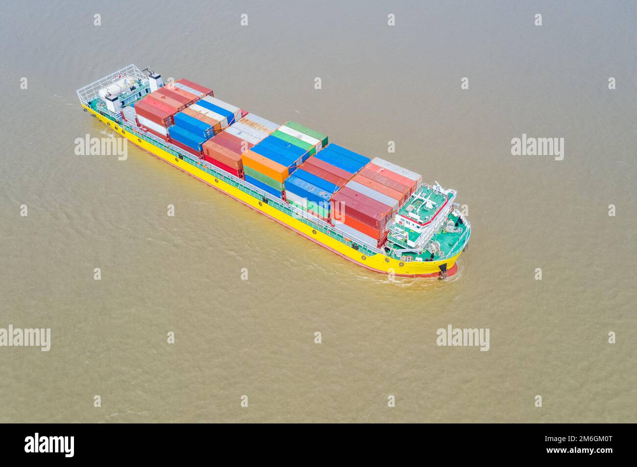 Aerial view of a container ship on river Stock Photo