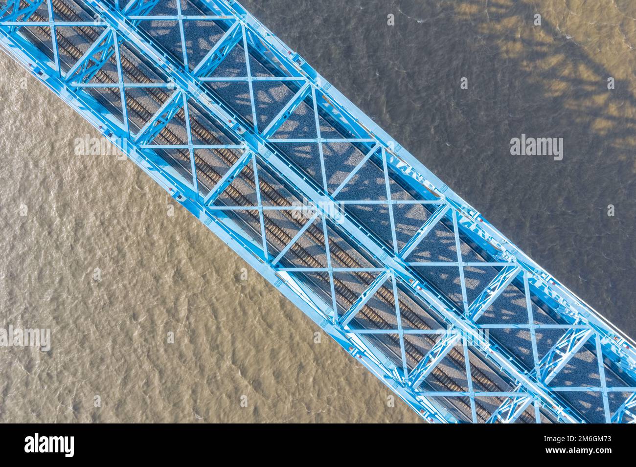 Aerial view of truss railway bridge on river Stock Photo