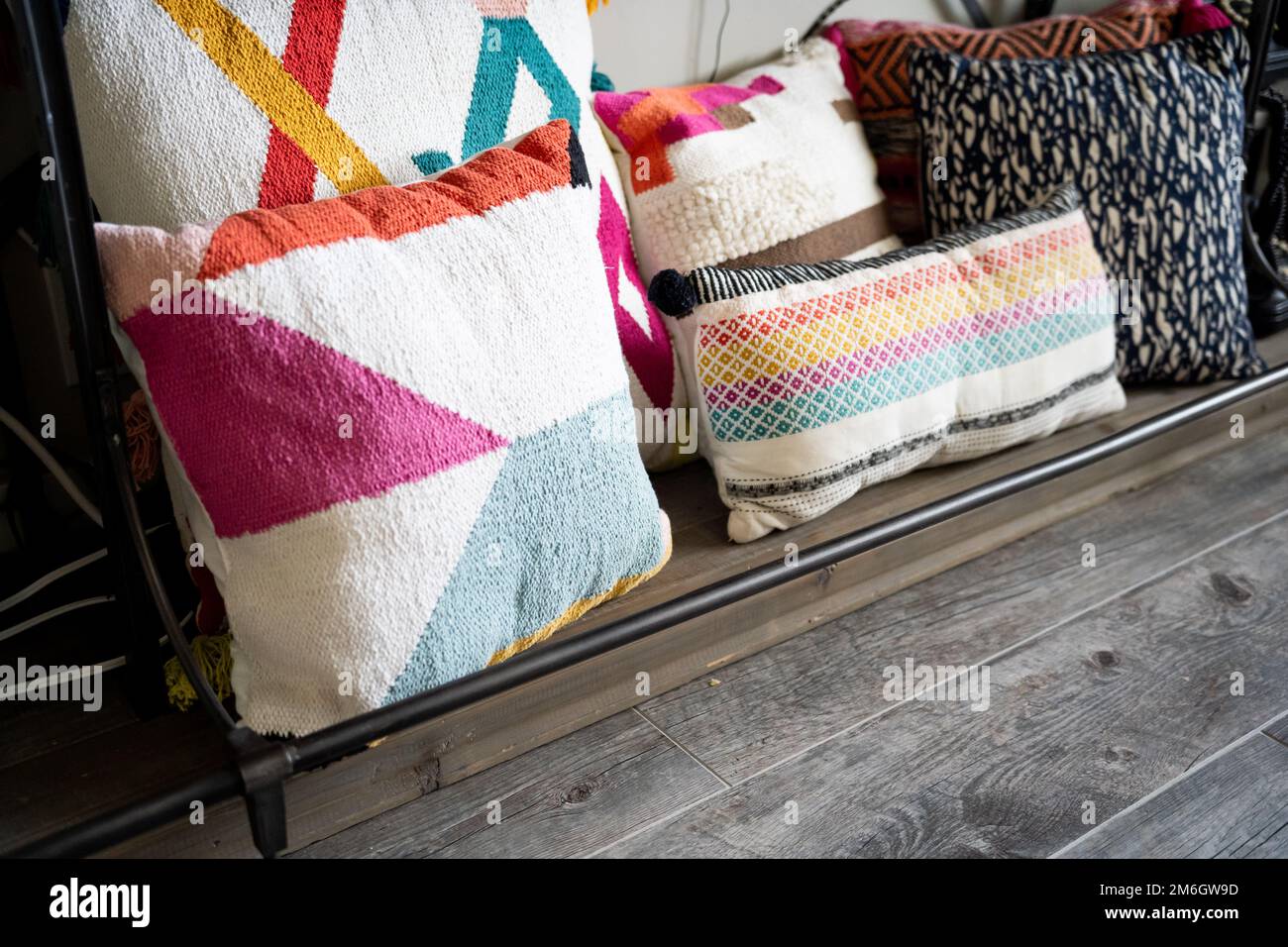 decorative pillows on iron shelf Stock Photo