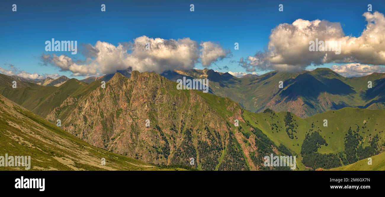 Mountain scenery wit clouds shadows Stock Photo