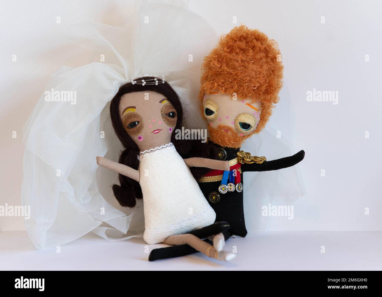 Handmade Prince Harry and Meghan Markle dolls. Created by an East London artist to celebrate the couples wedding on 19 May 2018. Stock Photo