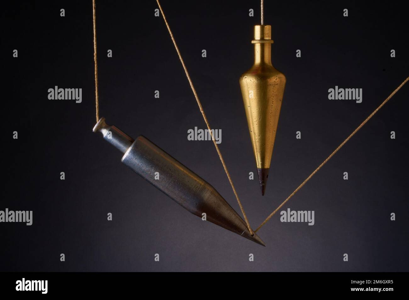 Plumb bobs, antique surveying equipment Stock Photo Alamy