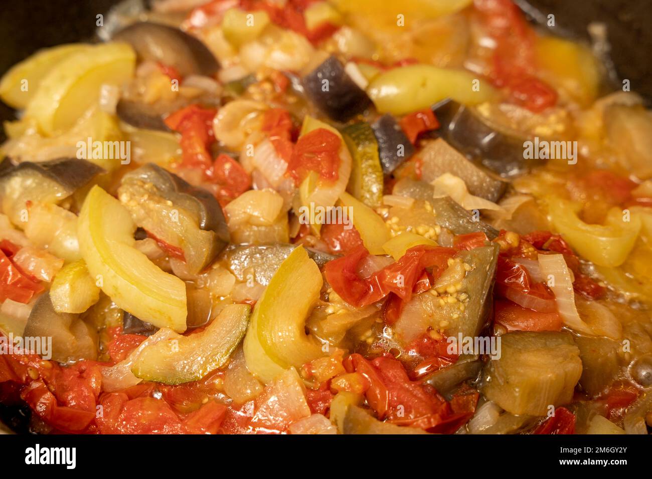 delicious juicy hot vegetable stew.ratatouille is cooked in frying pan