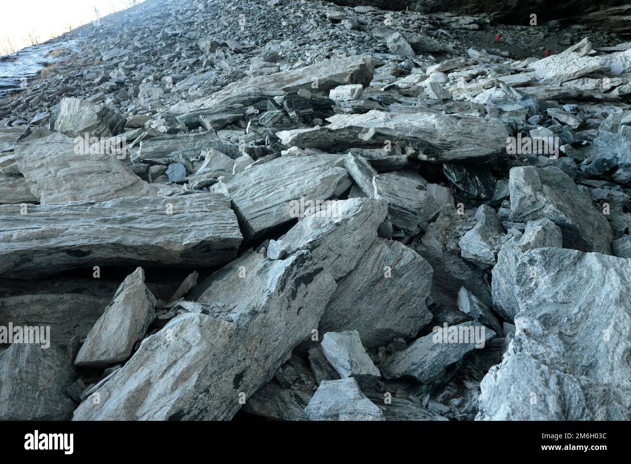 Stones and boulders at the foot of a mountain slope Stock Photo